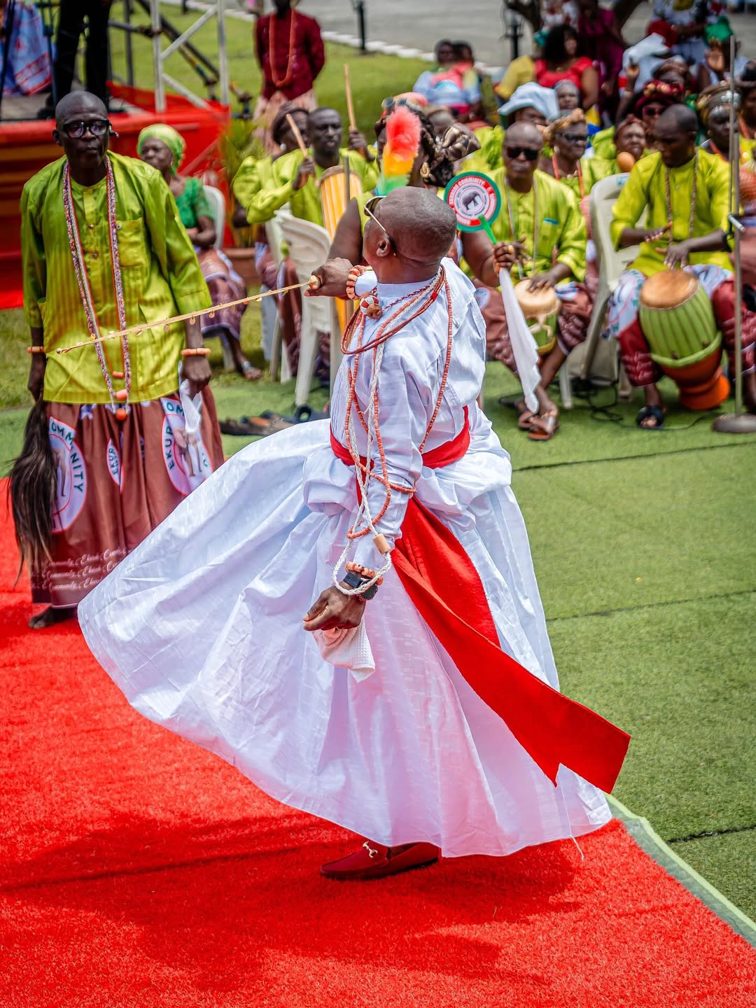 Green and white attires of Orere-Uluba