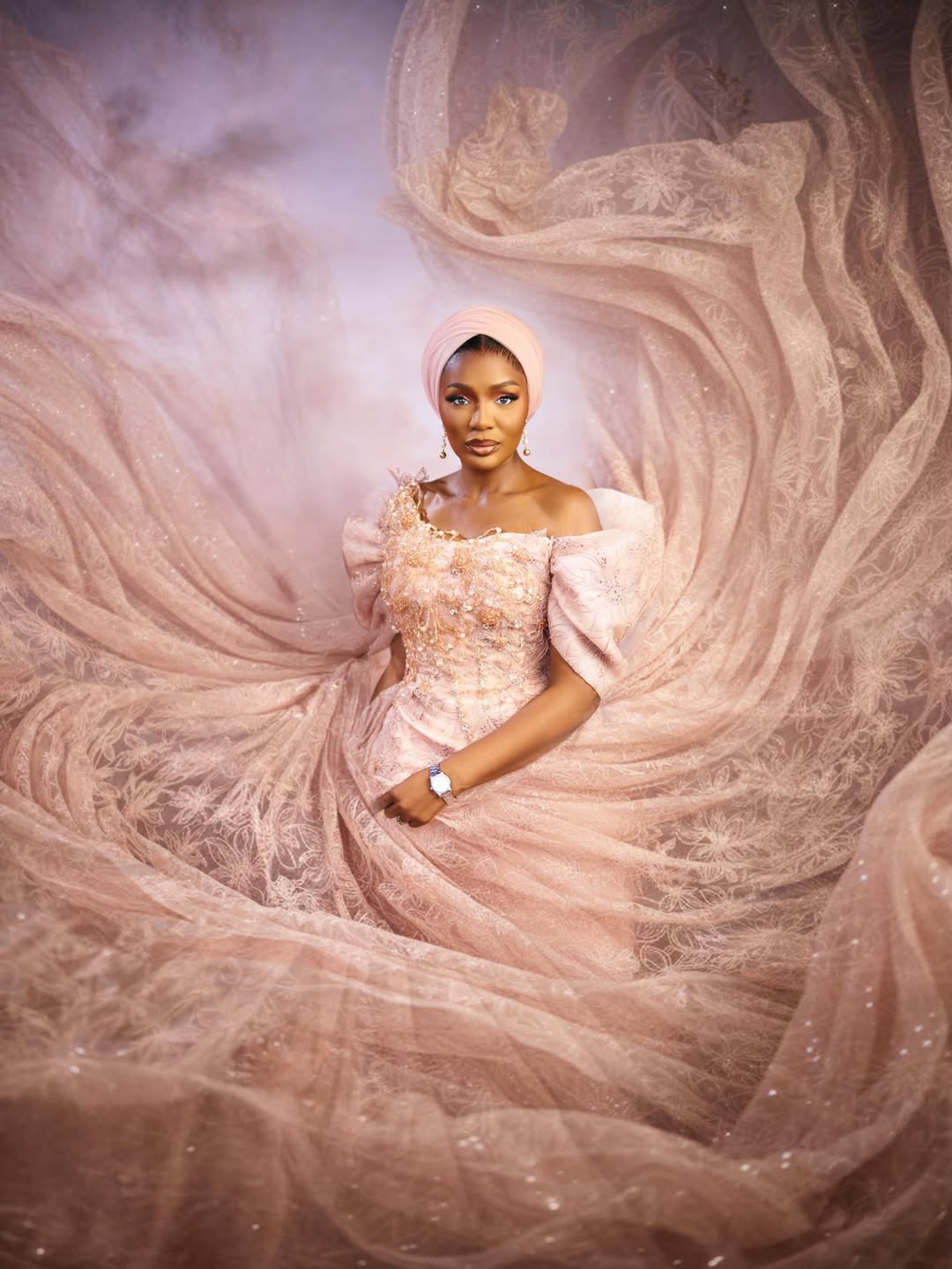 Olori Atuwatse III in an elegant blush birthday portrait